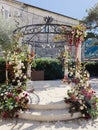 Wedding arch-rotunda near the building in the garden Royalty Free Stock Photo