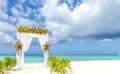 Wedding arch and set up on beach, tropical outdoor wedding Royalty Free Stock Photo