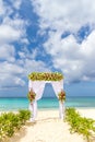 Wedding arch and set up on beach, tropical outdoor wedding Royalty Free Stock Photo