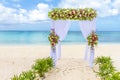 Wedding arch and set up on beach, tropical outdoor wedding Royalty Free Stock Photo