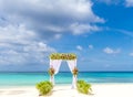 Wedding arch and set up on beach, tropical outdoor wedding Royalty Free Stock Photo