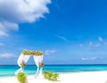 Wedding arch and set up on beach, tropical outdoor wedding Royalty Free Stock Photo