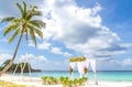 Wedding arch and set up on beach, tropical outdoor wedding Royalty Free Stock Photo