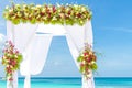 Wedding arch and set up on beach, tropical outdoor wedding Royalty Free Stock Photo