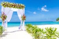 Wedding arch and set up on beach, tropical outdoor wedding Royalty Free Stock Photo