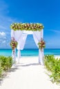 Wedding arch and set up on beach, tropical outdoor wedding Royalty Free Stock Photo