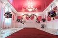 Wedding arch in the shape of two hearts in a hall for ceremonies Royalty Free Stock Photo