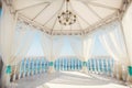 Wedding arch in Tiffany color on the beach.