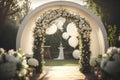 Wedding arch with white flowers and archway in the garden