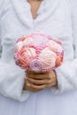 Wedding artificial bouquet in the bride hands