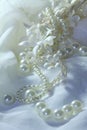 Wedding background with lace, pearls and ribbons. Royalty Free Stock Photo