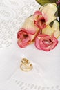 Wedding bands with three roses Royalty Free Stock Photo