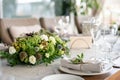 Wedding Banquet or gala dinner. The chairs and table for guests, served with cutlery and crockery. Covered with a linen Royalty Free Stock Photo