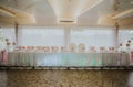 Wedding banquet hall with a beautiful table setting in white and pink colors Royalty Free Stock Photo