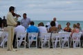 Traditional wedding party on the beach in Mexico with Mariachi music