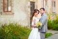 Wedding: beautiful bride and groom in the park on a sunny day Royalty Free Stock Photo
