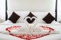 Wedding bed with fold a towel swan