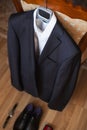 Wedding black jacket hanging on a chair. Royalty Free Stock Photo