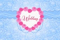 Wedding blue background with a frame of roses in the shape of a heart