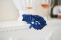 Wedding blue garter lies on a table