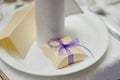 Wedding bonbonniere box with purple bow