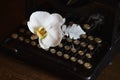 Wedding boquet and old typewriter Royalty Free Stock Photo