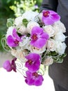 Wedding bouquet. Bouquet of fresh flowers, orchids and roses for the wedding ceremony. Royalty Free Stock Photo