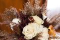Wedding bouquet for the bride with gold wedding rings as a gift Royalty Free Stock Photo