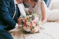 Wedding bouquet with bride and groom Royalty Free Stock Photo