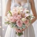 Wedding bouquet in bride\'s hands, beautiful wedding flowers. Bride\'s wedding bouquet with pastel pink roses and lilacs