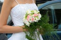 Wedding bouquet in brides hand