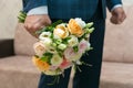 Wedding bouquet of bright yellow, pink, white roses Royalty Free Stock Photo