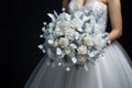 Wedding bouquet with butterflies in the hands of the bride Royalty Free Stock Photo