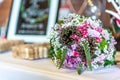 Wedding bouquet of flowers of bride closeup. Pink flower lying on a table Royalty Free Stock Photo