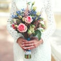 Wedding bouquet of flowers in hands bride Royalty Free Stock Photo