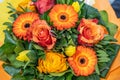 Wedding bouquet of flowers held by bride closeup. orange roses and flowers Royalty Free Stock Photo