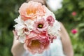 Wedding bouquet of flowers held by bride closeup. Pink flower Royalty Free Stock Photo