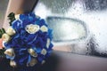 Wedding bouquet flowers of roses closeup in the car Royalty Free Stock Photo