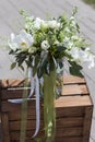 Wedding bouquet of flowers. White flower. The bouquet stands on a wooden box Royalty Free Stock Photo