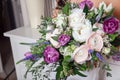 Wedding bouquet in hands of the bride