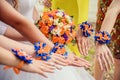 bridesmaids holding bouquets at the center