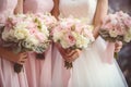 Wedding bouquet in the hands of the bride and groom, Wedding flowers, bride and bridesmaids holding their bouquets at wedding day Royalty Free Stock Photo