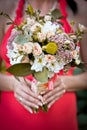 Wedding bouquet in hands of bride.