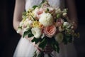 Wedding bouquet in the hands of the bride. Wedding in Montenegro, bride holding a beautiful wedding bouquet close to her chest, AI Royalty Free Stock Photo