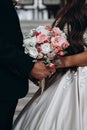 wedding bouquet in hands wedding bouquet of roses ring merried nature beautiful pink rich ring Royalty Free Stock Photo