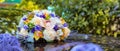 Wedding bouquet on the hood of a white retro car Royalty Free Stock Photo