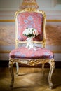 Wedding bouquet lying on chair