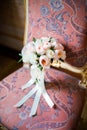 Wedding bouquet lying on chair