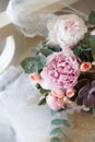 Wedding bouquet of peonies lying on the chair Royalty Free Stock Photo