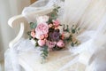 Wedding bouquet of peonies lying on the chair Royalty Free Stock Photo